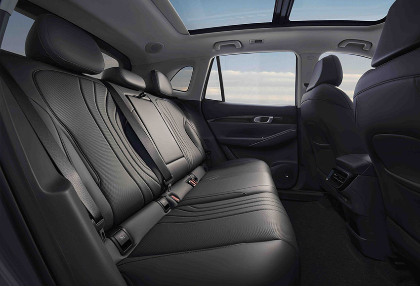 Rear seat in a Geely SUV with dark upholstery